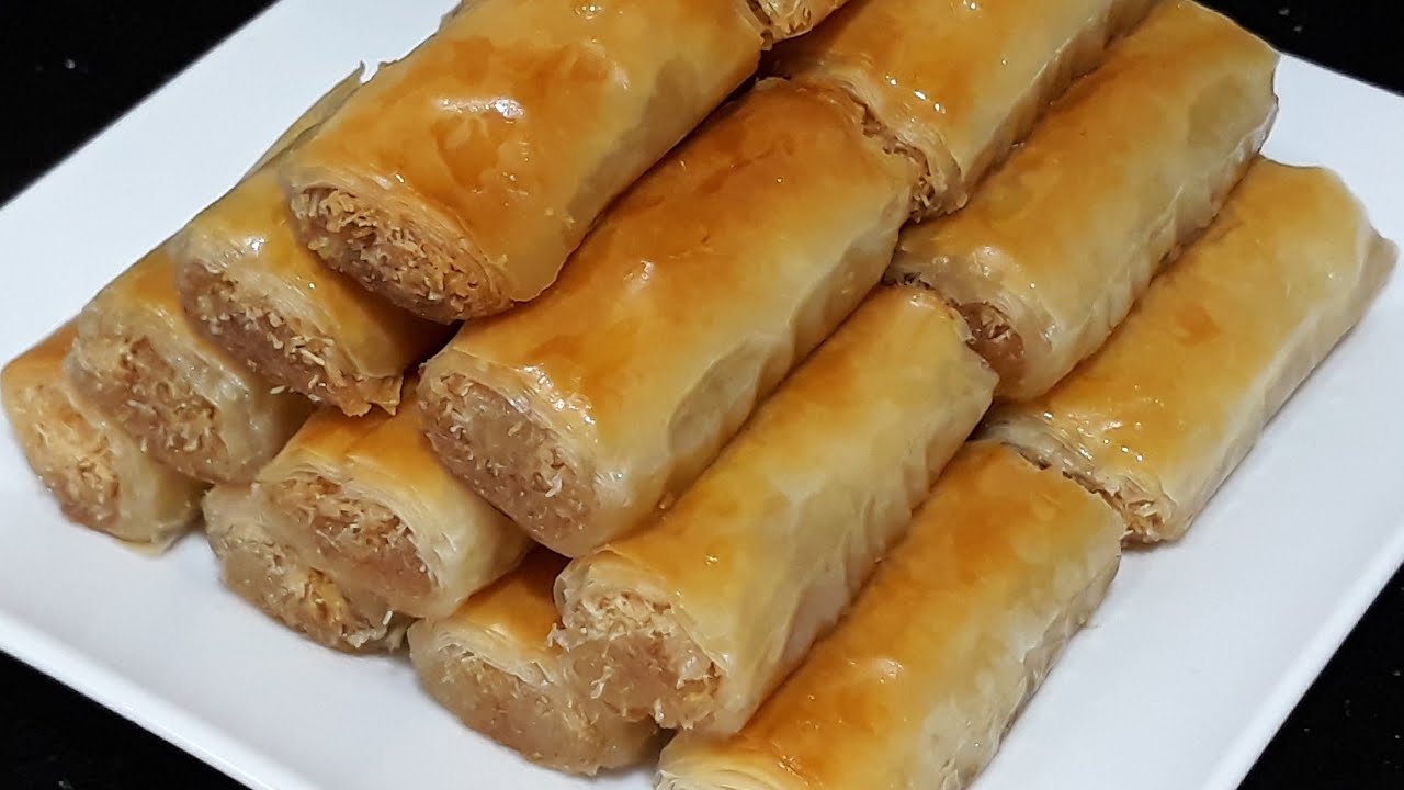 حلويات رمضان الشرقية أصابع الجلاش بالكنافة والمكسرات الشهية بمذاق طيب